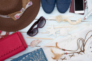 top view of traveler women's outfit and accessories